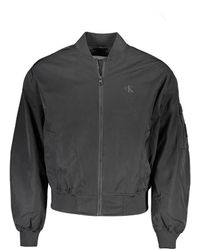 Calvin Klein - Schwarze jacke mit langen ärmeln und taschen - Lyst
