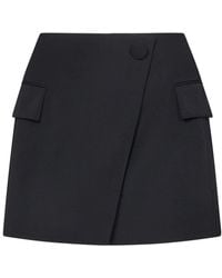 Balmain - Schwarzer Asymmetrischer Woll-Minirock - Lyst