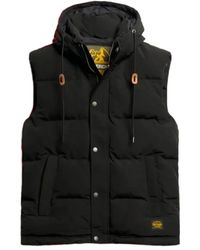 Superdry - Jassen ,Zwart ,Mouwloze Everest Gewatteerde Jas - Lyst