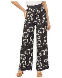 Yes-Zee - Pantalones palazzo negros florales - Lyst
