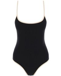 Totême - Toteme one piece swimsuit with contrasting trim details - Lyst