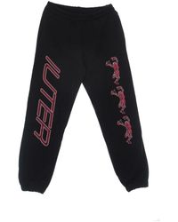 Iuter - Broeken ,Zwart ,Katoen Zwarte Skeleton Trainingsbroeken Tracksuit Elastische Boord - Lyst