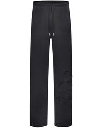flâneur - Zwarte Blossom Patches Jogger Broek - Lyst