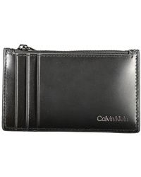 Calvin Klein - Portafoglio in pelle nera con porta carte - Lyst