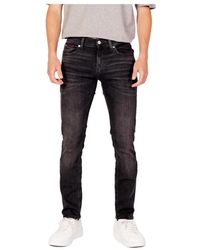 Tommy Hilfiger - Jeans uomo neri - Lyst