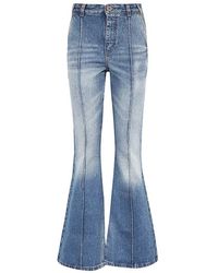 Balmain - Jeans ,Blauw ,Denim Flared Denim Broek Met Contraststiksels - Lyst