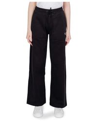 Calvin Klein - Pantaloni neri con lacci per donne - Lyst