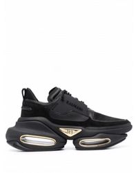 Balmain - Sneakers in pelle nera con logo oro - Lyst