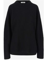 Jil Sander - Truien & Vesten ,Zwart ,Wol Zwarte Wollen Trui Met Ronde Hals - Lyst