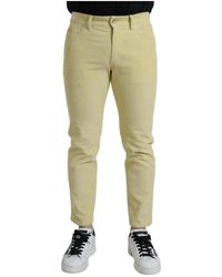 Dolce & Gabbana - Jeans skinny in velluto a coste giallo con logo - Lyst