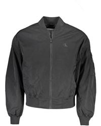 Calvin Klein - Schwarze jacke mit langen ärmeln und taschen - Lyst