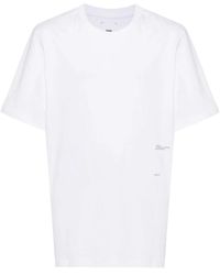 OAMC - T-shirt in cotone biologico bianco con stampa grafica - Lyst