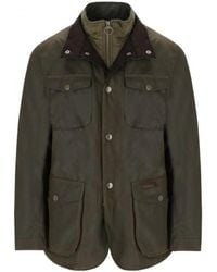 Barbour - Giacca verde in cotone cerato ogston - Lyst