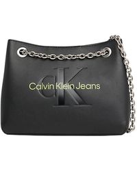 Calvin Klein - Schultertasche aus pu-leder mit geprägtem logo - Lyst