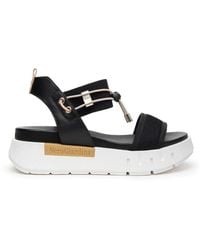 Nero Giardini - Flache Sandalen - Lyst