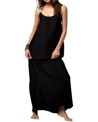 Beliza - Schwarzes fließendes langes kleid mit offenem rücken - Lyst