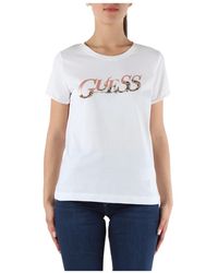 Guess - T-shirt in cotone con scritta logo frontale - Lyst
