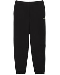 Lacoste - Broeken ,Zwart ,Katoen Tapered Leg Trainingsbroeken - Lyst