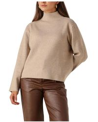 Minus - Truien & Vesten ,Zand High Neck Pullover Voor Vrouwen - Lyst