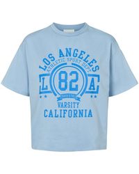 American Dreams - Tops ,Blauw ,Katoen Lichtblauwe Cropped Top Met Blauwe Letters - Lyst