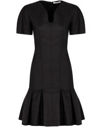 Nina Ricci - Kleedjes ,Zwart ,Wol Wollen Jurk Met Sweetheart Halslijn En Geplooide Rok - Lyst