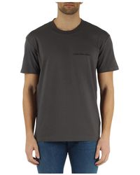 Calvin Klein - Baumwoll t-shirt mit logo-prägung - Lyst