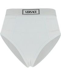 Versace - Fijngeibbelde Slip Met Logoband - Lyst