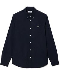 Lacoste - Overhemden ,Blauw ,Katoen Blauw Klassiek Overhemd Met Krokodillenborduursel - Lyst