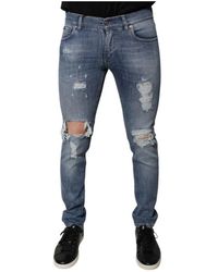 Dolce & Gabbana - Zerrissene skinny denim jeans mit logo - Lyst