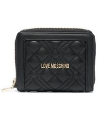 Love Moschino - Gestepptes schwarzes portemonnaie mit gold-logo - Lyst