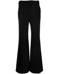 Jonathan Simkhai - Broeken ,Zwart ,Nylon Elegante Zwarte Bootcut Broek - Lyst