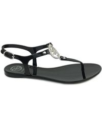 Guess - Flat Sandals - Lyst