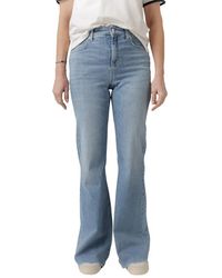 Cambio - Flared jeans mit verstecktem reißverschluss und weiten beinen - Lyst