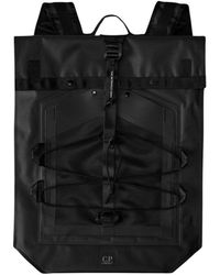 C.P. Company - Zwarte Rubberen Rugzak Met Mesh Zak - Lyst