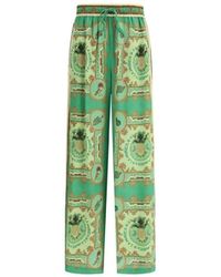 ALÉMAIS - Pantaloni verdi in seta a gamba larga - Lyst