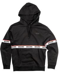 Moschino - Hoodies & Sweatvesten ,Zwart ,Katoen Logo Banda All Over Katoen Fleece Hoodie - Lyst