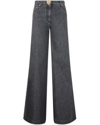 Moschino - Wide Jeans - Lyst