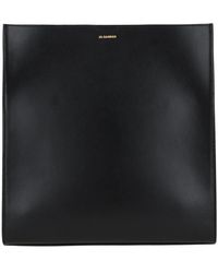 Jil Sander - Schwarze leder-schultertasche mit knotendetail - Lyst