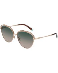 Tiffany & Co. - Rose gold/green shaded sonnenbrille - Lyst