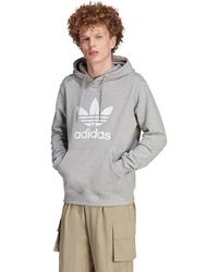 adidas - Hoodies & Sweatvesten ,Grijs ,Klassieke Trefoil Hoodie - Lyst