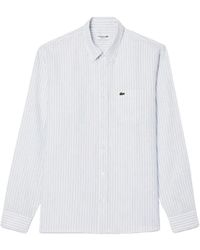 Lacoste - Camicia regular fit in lino blu/azzurro/bianco - Lyst