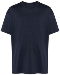 Givenchy - Blaues jersey-t-shirt mit geprägtem logo und rundhalsausschnitt - Lyst