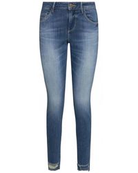 Guess - Blaue skinny jeans mit aufgenähtem logo - Lyst