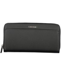 Calvin Klein - Geldbörse schwarz rfid reißverschluss logo - Lyst