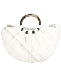Coccinelle - Kleine Shell Henkeltasche - Lyst