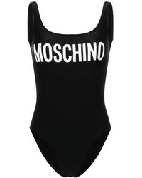 Moschino - Schwarze meer kleidung mit logo-druck - Lyst