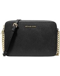 Michael Kors Outlet - Bandolera Jet Set grande de piel saffiano - Lyst