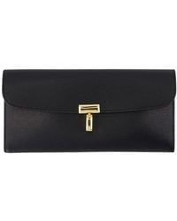 TOTEME - Schwarzes leder t-lock geldbörse - Lyst