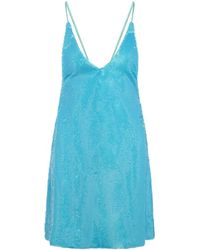 Ganni - Blaues pailletten mini-kleid mit v-ausschnitt und rückenkreuz - Lyst