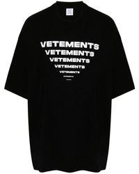 Vetements - Schwarzes baumwoll-t-shirt mit logo-print - Lyst